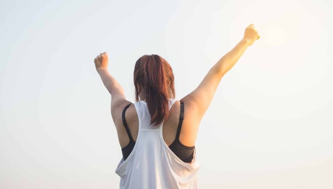 Data to improve wellness - women with arms up