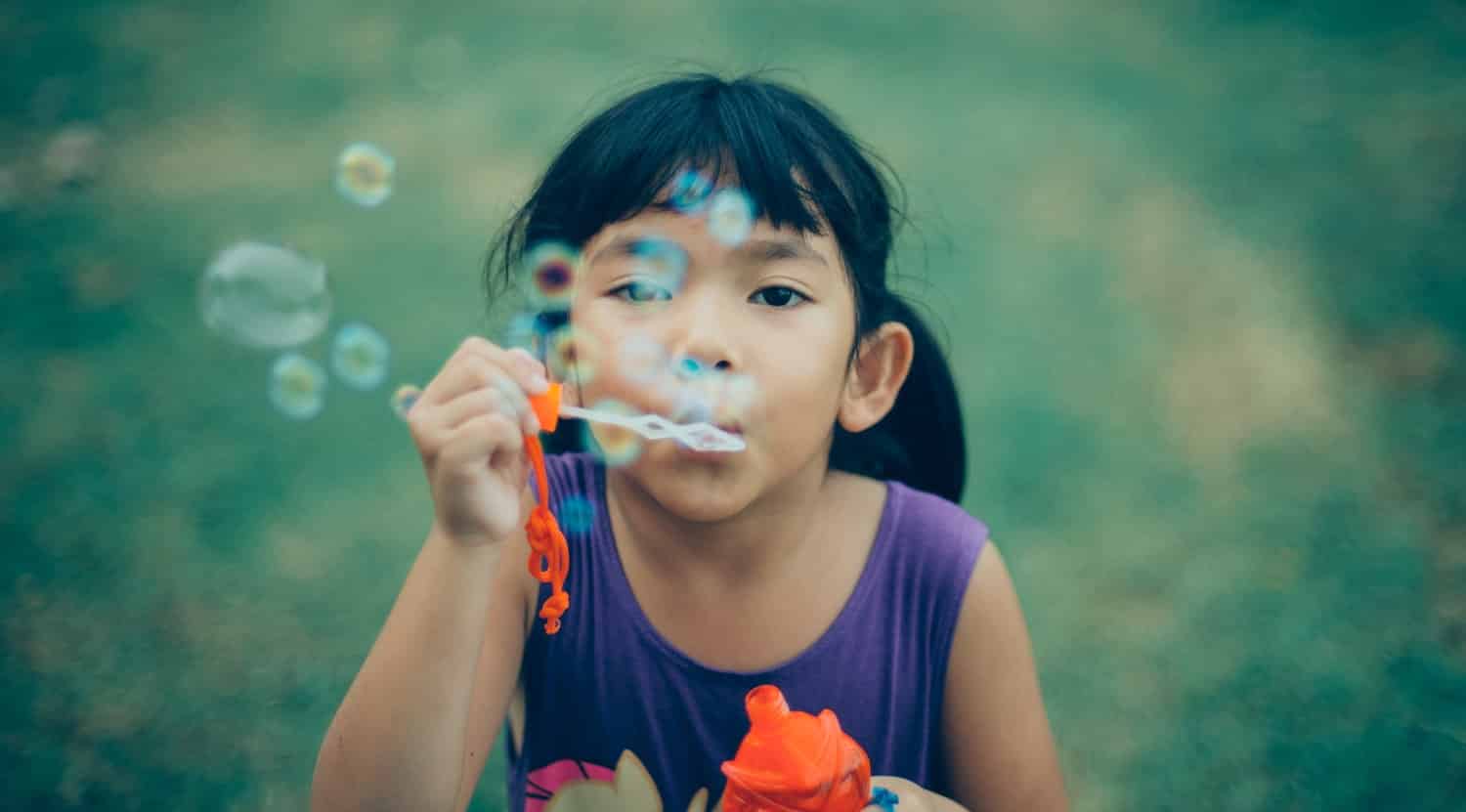 Sales spotlight - child blowing bubbles